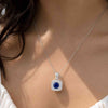 Cushion Cut Sapphire Halo Pendant Necklace with Diamond Accent