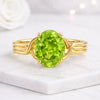 Oval Cut Peridot Ring in 14K Yellow Gold