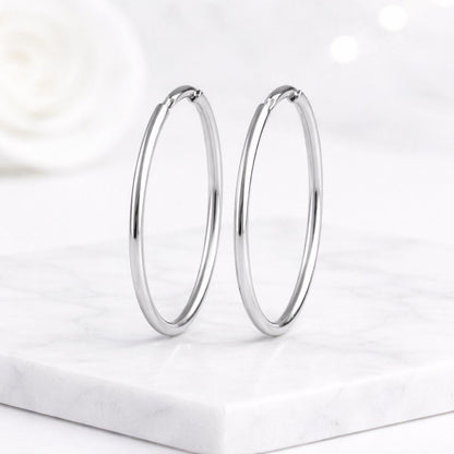 stackable hoops daily earrings casual earrings dressy earrings modern hoops gift earrings chic hoop earrings refined hoops luxury earrings statement hoops delicate hoops narrow hoop earrings bright gold hoops classic jewelry versatile earrings
