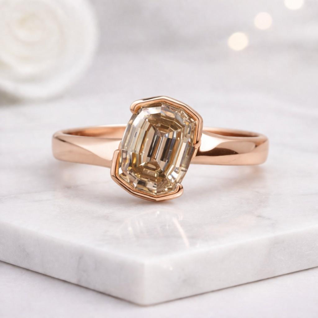 step cut cushion ring emerald cut ring bezel set ring solitaire ring rose gold ring thin band ring modern ring geometric ring faceted stone ring crystal ring womens ring statement ring sleek ring polished ring clean line ring elegant ring